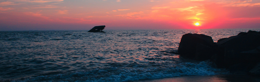Location Customizable Mini Thin - Beach Backgrounds SUNSET OVER WATER WITH ROCKS